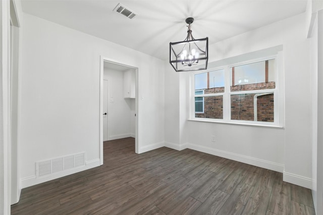 2428 Meadow Crk, Bedford, TX 76021 - unfurnished dining area with a chandelier and dark wood-style floors