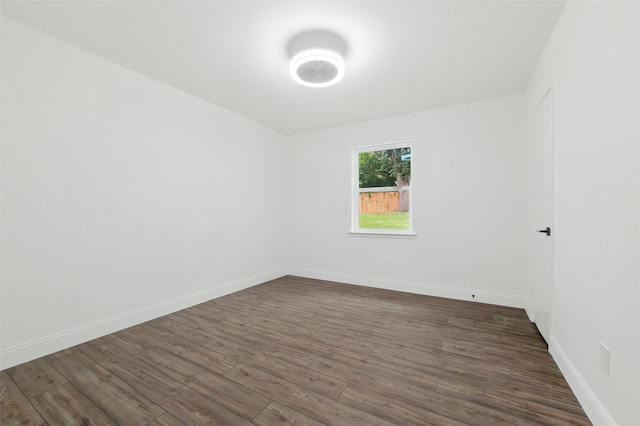 2428 Meadow Crk, Bedford, TX 76021 - unfurnished room featuring dark wood finished floors and baseboards