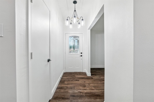 2428 Meadow Crk, Bedford, TX 76021 - foyer featuring a chandelier and dark wood-style floors