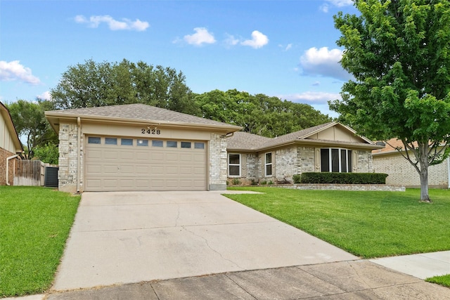 2428 Meadow Crk, Bedford, TX 76021 - view of front facade with a garage and driveway