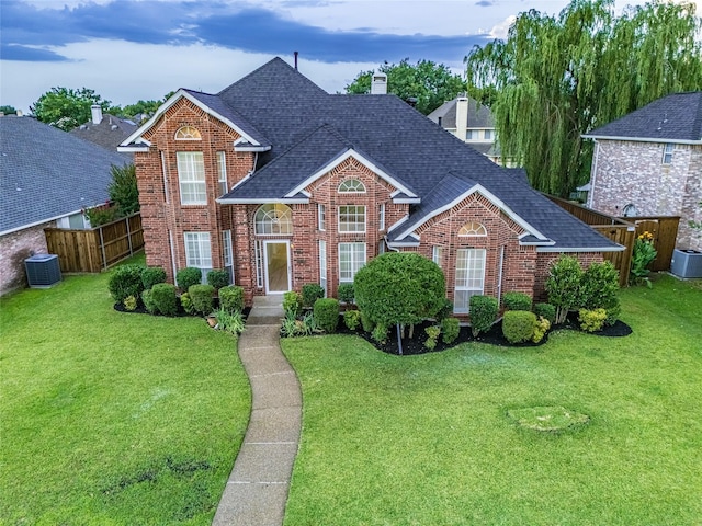 1106 Timbercreek Dr, Allen, TX 75002 - view of front of home with a shingled roof, brick siding, and a chimney