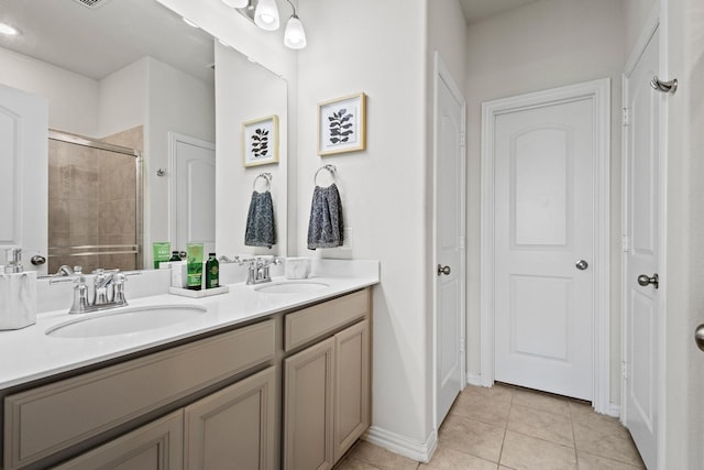 1021 Adelyn St, Anna, TX 75409 - full bathroom with double vanity, tile patterned floors, and tiled shower