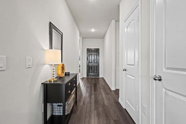 1021 Adelyn St, Anna, TX 75409 - hall featuring dark wood-type flooring, baseboards, and recessed lighting