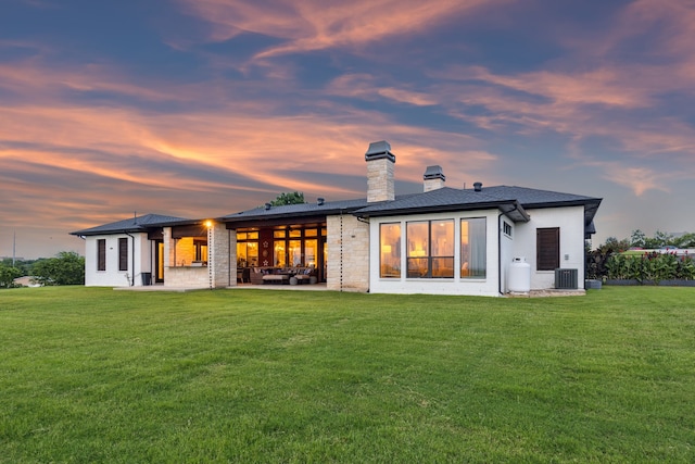 1001 Colina Vista Ln, Crowley, TX 76036 - rear view of property with a chimney, a patio, a lawn, and cooling unit
