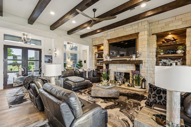 1001 Colina Vista Ln, Crowley, TX 76036 - living room with ceiling fan, beam ceiling, a fireplace, wood finished floors, and recessed lighting