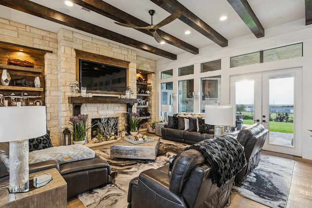 1001 Colina Vista Ln, Crowley, TX 76036 - living room with a ceiling fan, beam ceiling, french doors, a fireplace, and wood finished floors