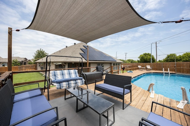 2133 Blakely Ct, Fort Worth, TX 76134 - view of swimming pool with an outdoor living space, a fenced backyard, and a wooden deck