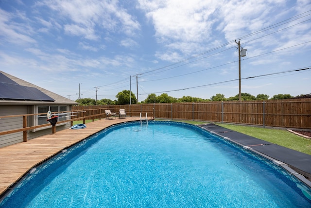 2133 Blakely Ct, Fort Worth, TX 76134 - view of pool with a deck and a fenced backyard