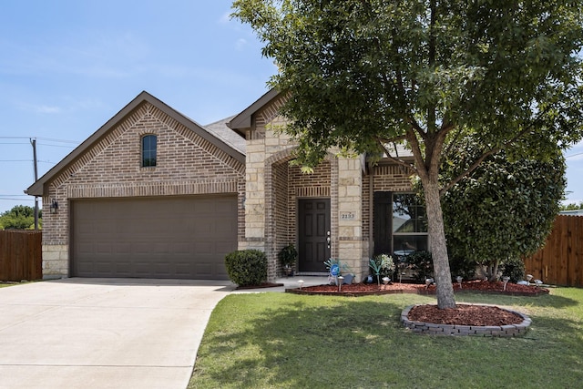 2133 Blakely Ct, Fort Worth, TX 76134 - view of front facade featuring brick siding, stone siding, an attached garage, and concrete driveway