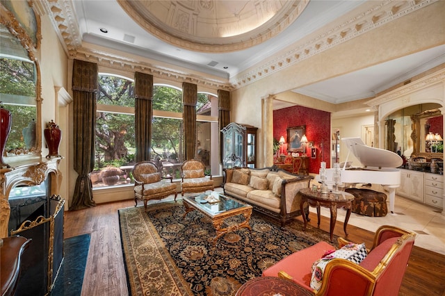 1524 Eastwick Ln, Plano, TX 75093 - living area with a raised ceiling, crown molding, wood finished floors, and a high ceiling