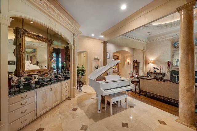 1524 Eastwick Ln, Plano, TX 75093 - living area featuring decorative columns, crown molding, arched walkways, light tile patterned floors, and recessed lighting