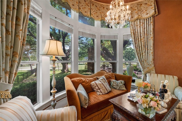 1524 Eastwick Ln, Plano, TX 75093 - sunroom featuring a chandelier and a towering ceiling