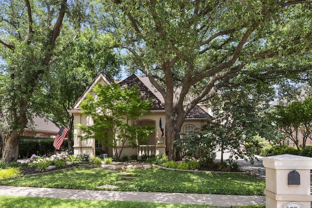 1524 Eastwick Ln, Plano, TX 75093 - view of property hidden behind natural elements with stucco siding