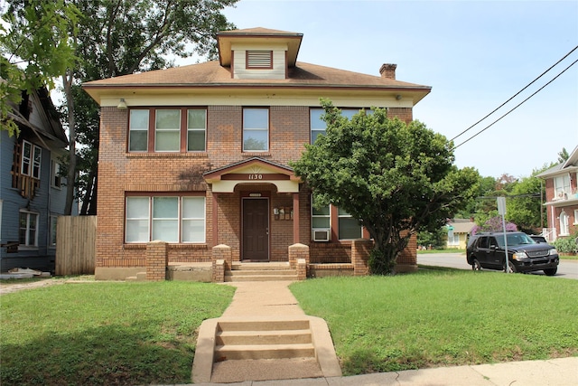 1130 Kings Hwy, Dallas, TX 75208 - american foursquare style home featuring brick siding, a front yard, and a chimney