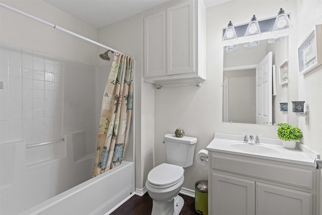 3328 Royal Crest Dr, Fort Worth, TX 76140 - bathroom with vanity, shower / bathtub combination with curtain, wood finished floors, toilet, and baseboards