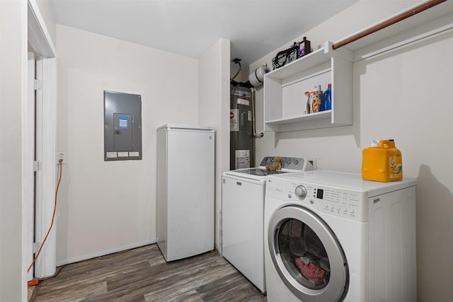 3328 Royal Crest Dr, Fort Worth, TX 76140 - laundry area featuring electric panel, washer and dryer, wood finished floors, and water heater