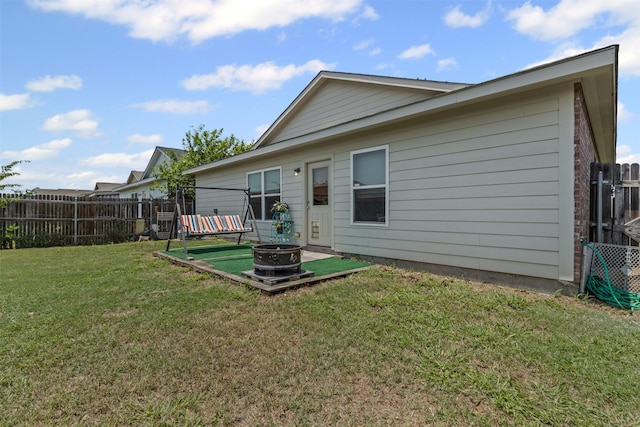3328 Royal Crest Dr, Fort Worth, TX 76140 - back of property with an outdoor fire pit