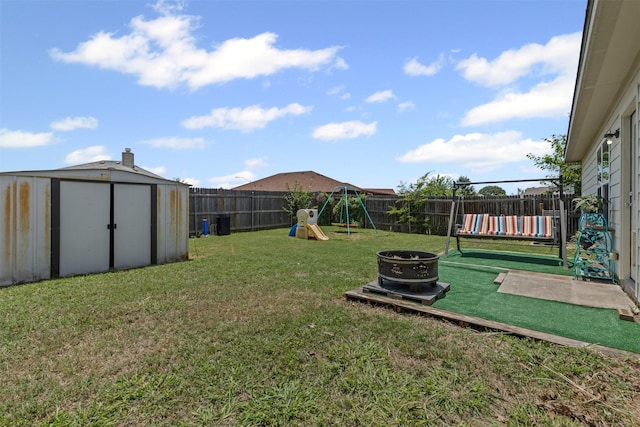 3328 Royal Crest Dr, Fort Worth, TX 76140 - view of yard with a playground and an outdoor fire pit