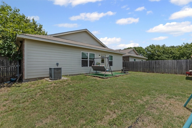 3328 Royal Crest Dr, Fort Worth, TX 76140 - rear view of property featuring central AC unit