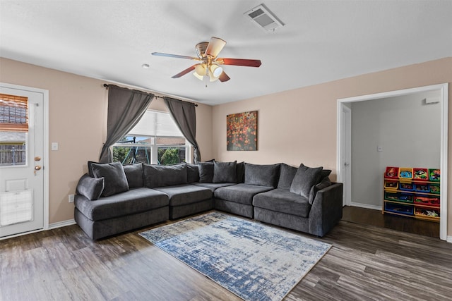 3328 Royal Crest Dr, Fort Worth, TX 76140 - living area with a ceiling fan, wood finished floors, and baseboards