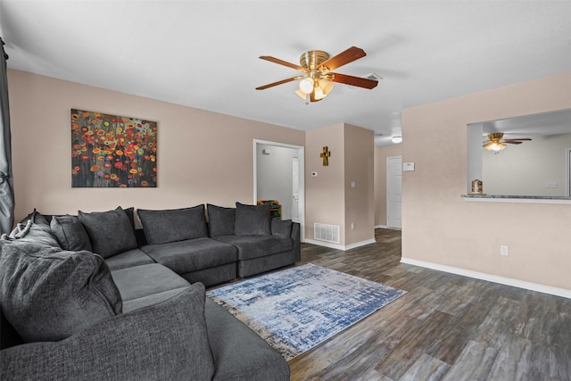 3328 Royal Crest Dr, Fort Worth, TX 76140 - living area featuring ceiling fan, wood finished floors, and baseboards