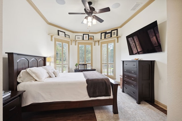 508 Moraine Way, Heath, TX 75032 - bedroom with crown molding, light wood-type flooring, access to exterior, and ceiling fan