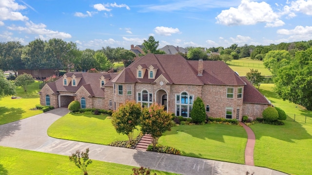 508 Moraine Way, Heath, TX 75032 - french provincial home with a chimney, brick siding, and stone siding