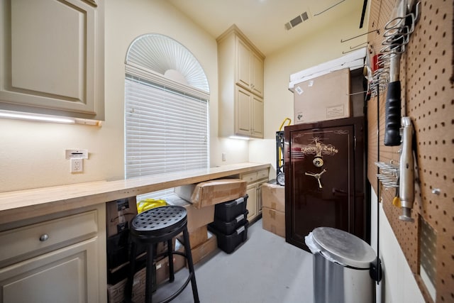 508 Moraine Way, Heath, TX 75032 - kitchen featuring cream cabinets, wood counters, and concrete floors