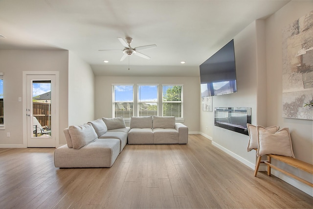 4007 Buckeye Bnd, Melissa, TX 75454 - living room featuring ceiling fan, light wood-style flooring, healthy amount of natural light, and recessed lighting