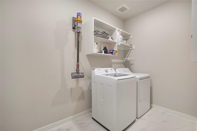 4007 Buckeye Bnd, Melissa, TX 75454 - laundry room with washer and clothes dryer, light marble finish floors, and baseboards