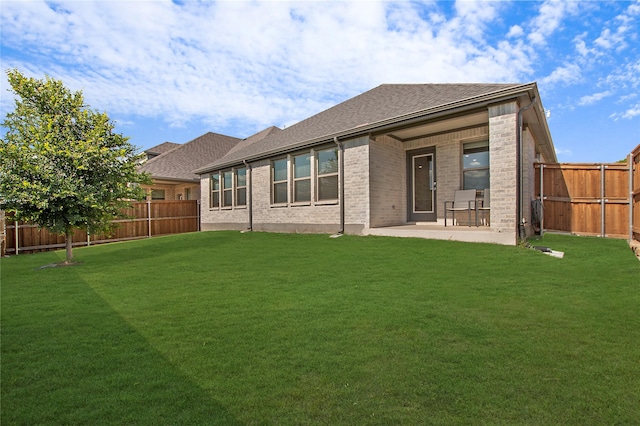 4007 Buckeye Bnd, Melissa, TX 75454 - rear view of house with a patio, brick siding, and roof with shingles