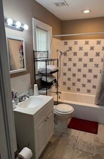 3416 W Gambrell St, Fort Worth, TX 76133 - full bathroom with vanity, shower / tub combination, and toilet