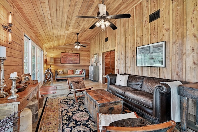 4920 County Road 179, Celina, TX 75009 - living room featuring wooden ceiling, wooden walls, vaulted ceiling, ceiling fan, and wood finished floors
