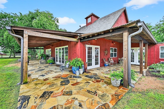 4920 County Road 179, Celina, TX 75009 - doorway with french doors, finished concrete flooring, recessed lighting, wood walls, and wood ceiling