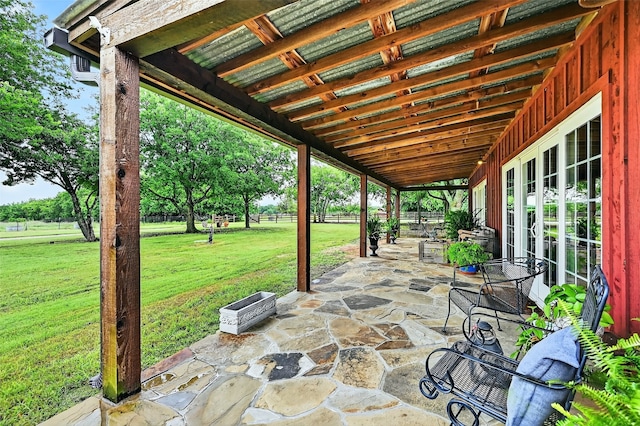 4920 County Road 179, Celina, TX 75009 - bedroom featuring wood walls and ceiling fan