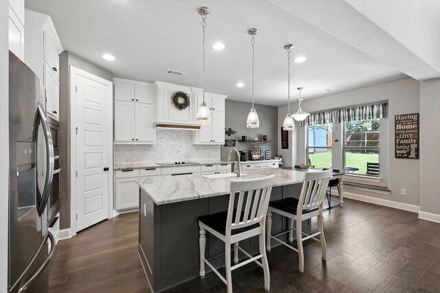 7431 Bald Cypress Dr, Ovilla, TX 75154 - kitchen featuring smart refrigerator, dark wood-style floors, backsplash, recessed lighting, and white cabinetry