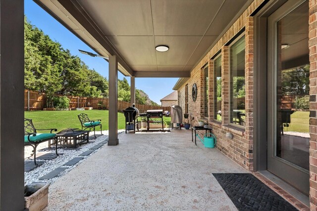 7431 Bald Cypress Dr, Ovilla, TX 75154 - fenced backyard with a patio area and area for grilling