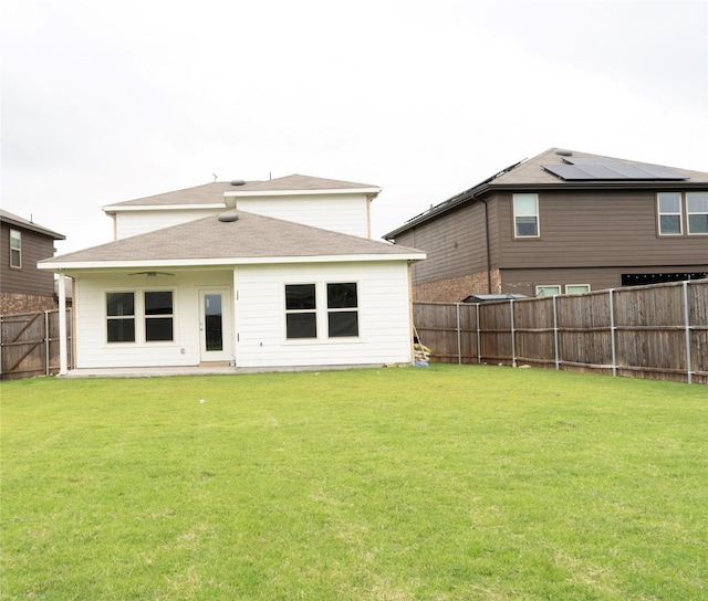 1610 Seadrift Dr, Forney, TX 75126 - rear view of house with a fenced backyard, ceiling fan, and a shingled roof