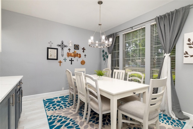 4405 Vista Meadows Dr, Fort Worth, TX 76244 - dining room with a chandelier, baseboards, and light wood-style flooring