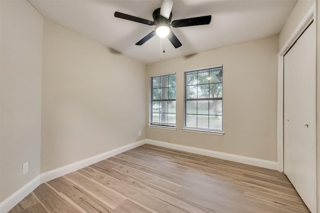 3301 Cliffview Dr, Corinth, TX 76210 - unfurnished bedroom featuring light wood-style flooring, baseboards, a closet, and ceiling fan
