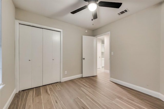 3301 Cliffview Dr, Corinth, TX 76210 - unfurnished bedroom featuring light wood-style flooring, baseboards, a closet, and ceiling fan