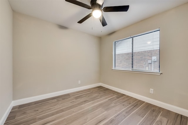 3301 Cliffview Dr, Corinth, TX 76210 - spare room with baseboards, light wood finished floors, and ceiling fan