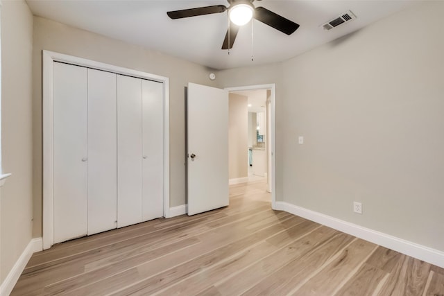 3301 Cliffview Dr, Corinth, TX 76210 - unfurnished bedroom with light wood-style floors, baseboards, a closet, and ceiling fan