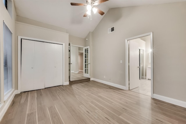 3301 Cliffview Dr, Corinth, TX 76210 - unfurnished bedroom featuring light wood-style floors, baseboards, high vaulted ceiling, a ceiling fan, and a closet