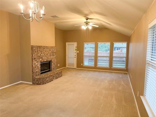 9404 Mirror Fountain Cir, Frisco, TX 75033 - unfurnished living room with carpet floors, vaulted ceiling, a ceiling fan, a glass covered fireplace, and a chandelier