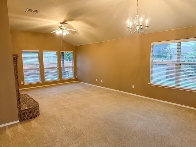 9404 Mirror Fountain Cir, Frisco, TX 75033 - empty room with lofted ceiling, ceiling fan, a chandelier, light carpet, and baseboards