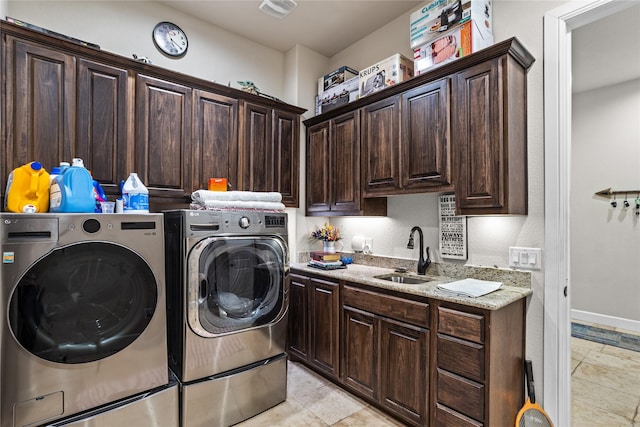 5100 Swisher Rd, Denton, TX 76208 - laundry area with washer and dryer, cabinet space, and baseboards