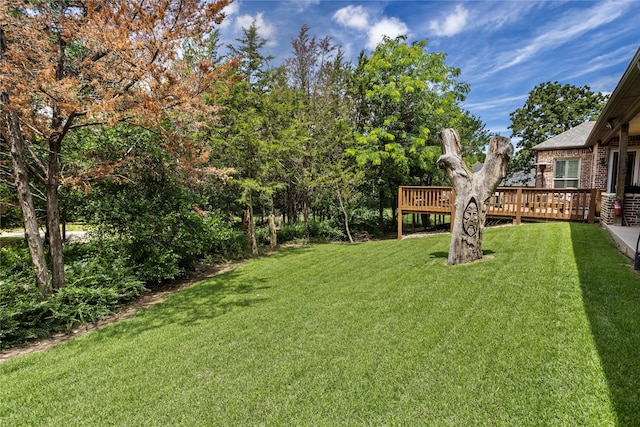 5100 Swisher Rd, Denton, TX 76208 - view of grassy yard with a deck