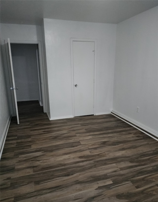 4214 Mehalia Dr, Dallas, TX 75241 - unfurnished room featuring dark wood finished floors and baseboards
