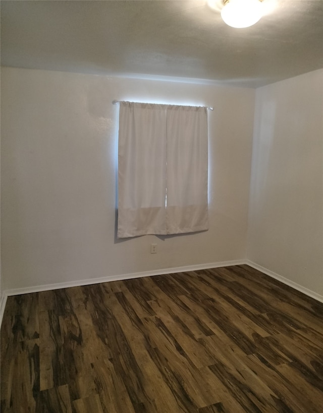 4214 Mehalia Dr, Dallas, TX 75241 - spare room with dark wood finished floors and baseboards